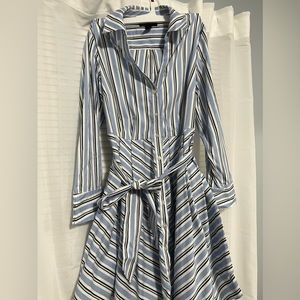 Beautiful dress colors black light blue and white button-down long sleeve’s.